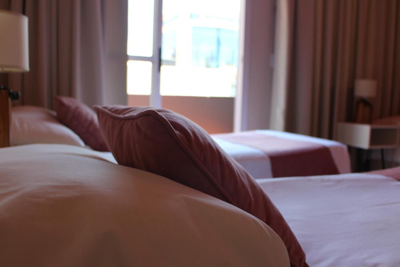 City Hotel Posadas Bagian luar foto