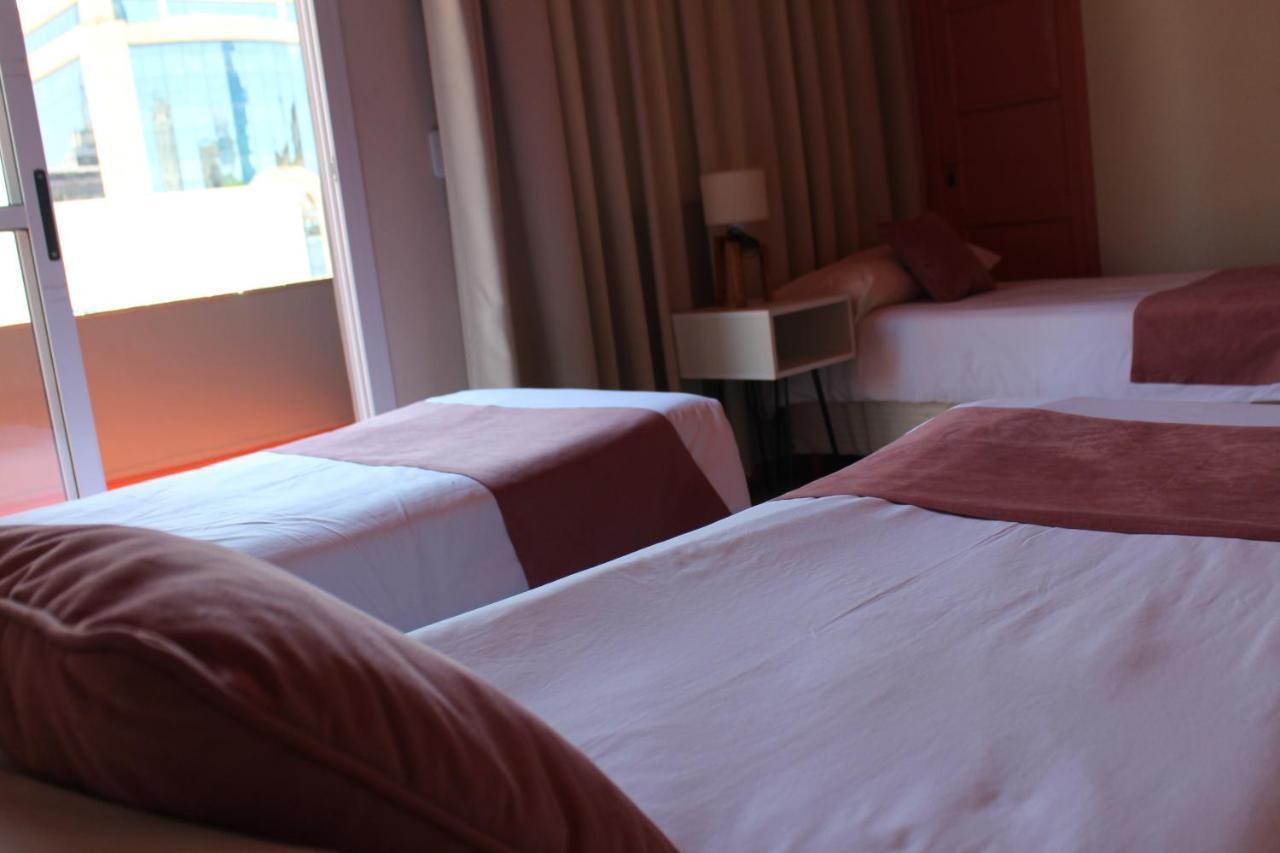 City Hotel Posadas Bagian luar foto